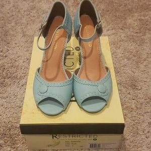 Never worn in both Restricted Dorothy Leather Heels Size 8 powder blue